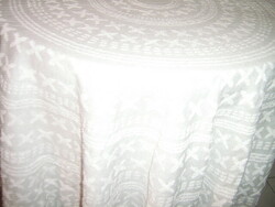 Beautiful gray white fringed tablecloth with fringed edges
