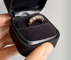 Gold wedding ring with brilliant diamonds