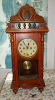 Carved Hungarian coat of arms pendulum wall clock with key. It needs to be fixed. 70 cm high