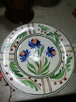 Ceramic plate 62. It is in the condition shown in the pictures