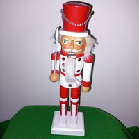 Red and white wooden nutcracker soldier.