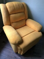 Brand new relaxation armchair with footrest.