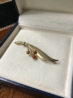 Old gilded brooch with noble corals