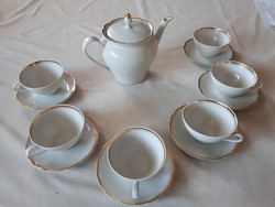 Porcelain coffee and tea set with gilded edges