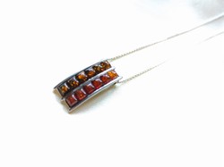 Silver necklace with amber pendant
