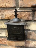 Antique plate-covered coffee grinder