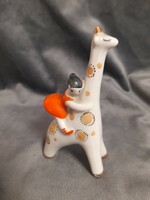 P 19 --- little girl with a giraffe - Ukrainian porcelain