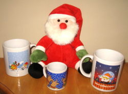 Santa figure with Christmas mugs