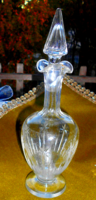 Antique glass bottle with polished pattern and original engraved stopper