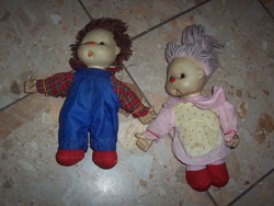 Boy and girl in an old doll pair