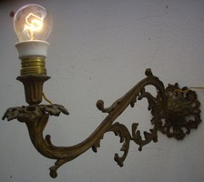 It was an antique 200-year-old wall arm with a candle holder