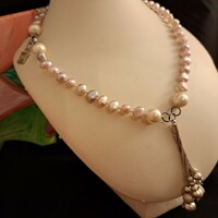 Snö marked exclusive freshwater asymmetric string of pearls