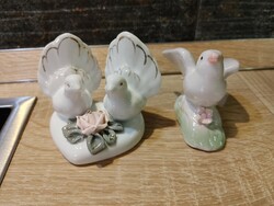 Pigeon porcelain figurines in a pair of roses