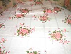Beautiful vintage pink bed linen set with a bouquet of violets