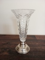Crystal vase on a silver-plated base