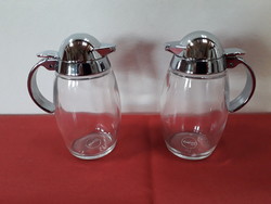 2 brand new small glass jugs