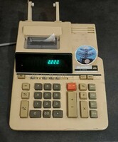 Retro sharp calculator with green display,