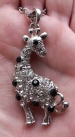 Diamond-cut silver-plated chain with rhinestone giraffe pendant.