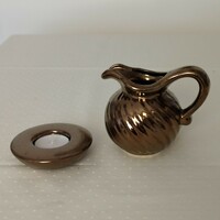 Gold colored ceramic small jug and candle holder