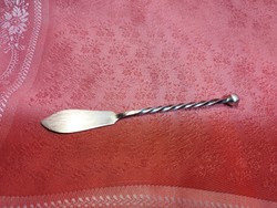 A letter opener, perhaps silver?