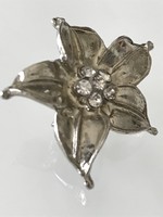 Orchid-shaped brooch with small crystals in the middle, 3 cm in diameter