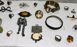 A collection of antique jewelry for sale in a mix of silver and jewels!