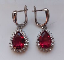 Red zircon earrings.