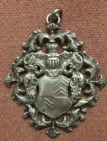 Large antique silver coat of arms pendant