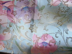 Beautiful floral / festive tablecloth in pastel colors