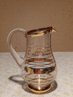 Small glass jug with gold stripes