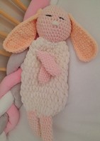 Hand crocheted sleeping plush bunny.