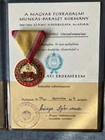 Service medal after 10 years with awarding document
