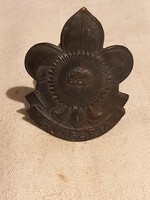 Old scout cap badge with orphan hair holder