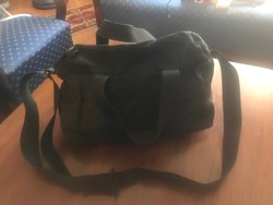 Mandarinaduck md20 brand, barely used handbag. Black fabric, with a strap that can also be hung on the shoulder.