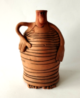 Figurative vase of fired clay by a humorous industrial artist
