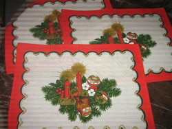 Beautiful red Christmas napkin with candles, pine branches, placemat, placemat