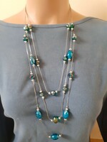 Necklace decorated with three-row polished glass and Murano pearls
