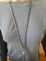Long, gray-blue, small square necklace made of cut glass