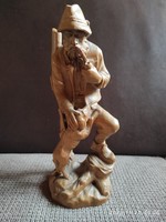 Wooden hunter statue
