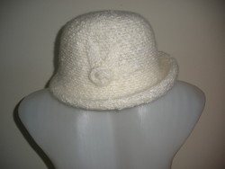 Cream-colored, elegant hat