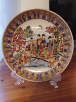 Porcelain decorative plates. Decorated with golden chandelier.