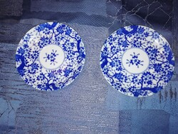 A pair of Japanese eggshell porcelain plates with blue flowers