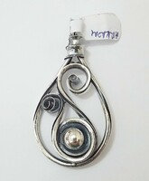 Silver pendant handmade, antiqued, bent