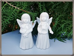Snow-white porcelain standing angels