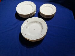 18dbos Zsolnay porcelán apró virágmintás arany színű tollazott tányérkészlet
