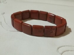 Red jasper mineral bracelet.