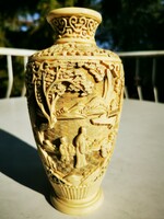 Chinese vase with plastic carvings