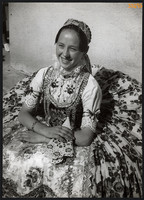 Larger size, photo art work by István Szendrő. Girl in national costume, skirt, colander