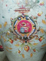 The antique coat-of-arms vase is in the condition shown in the pictures