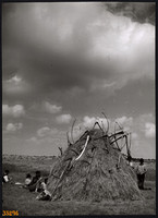 Larger size, photo art work by István Szendrő. Resting peasants in the field, harvest
